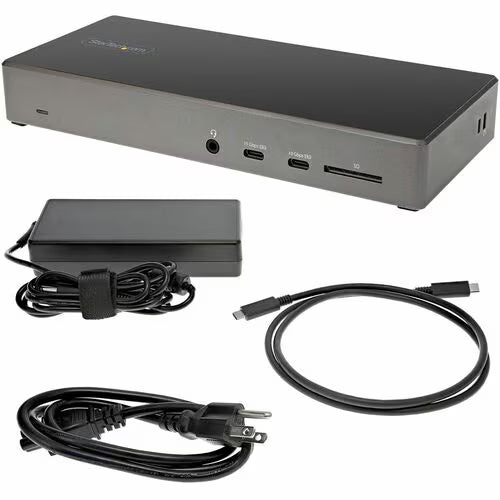 Docking station with power adapter and cables on a white background