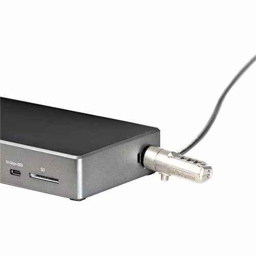 Close-up of a metallic device with a key-like connector on a white background